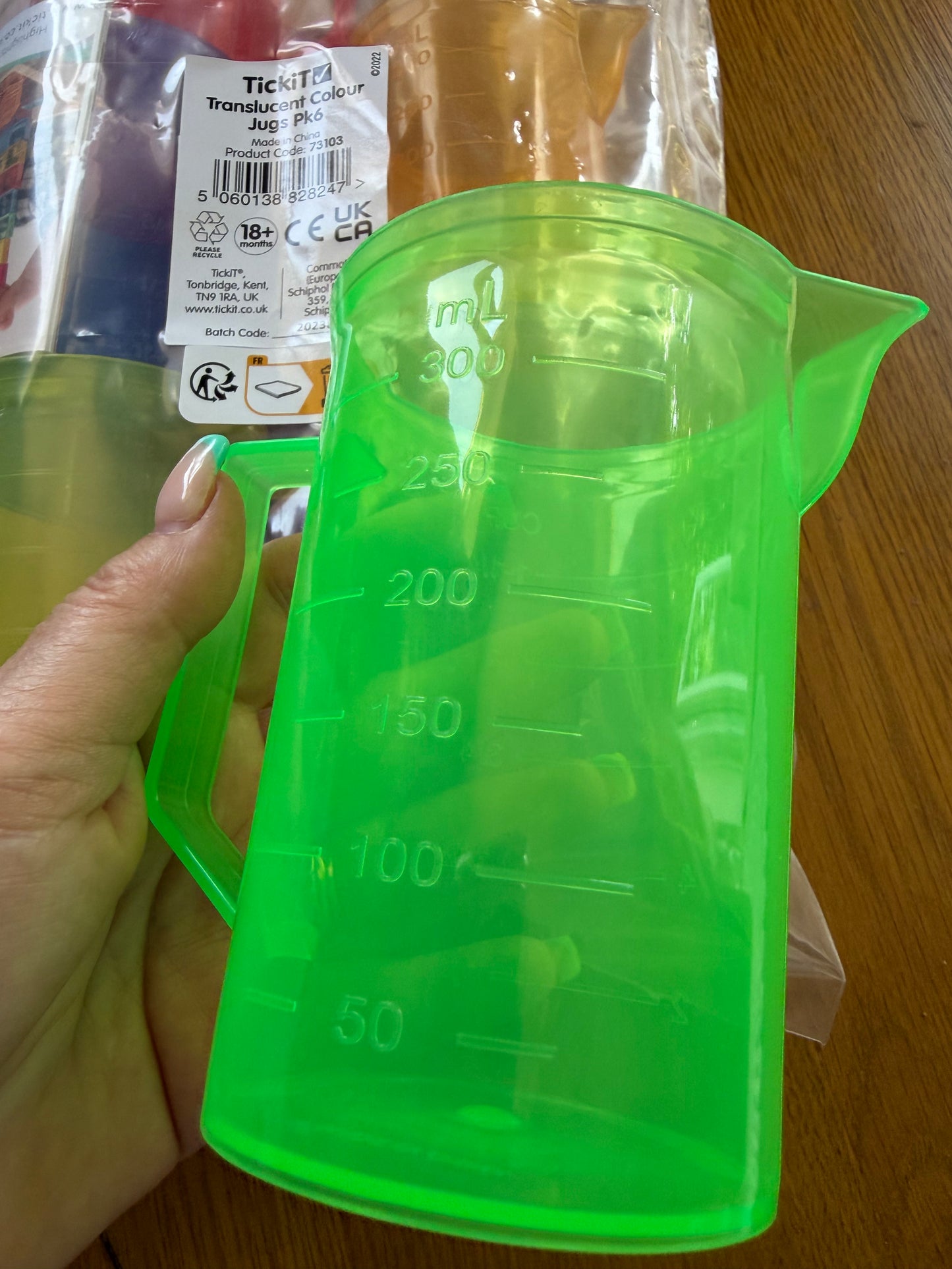 Set of size rainbow translucent jugs with measuring - sale clearance
